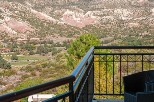 a view of the mountains from a balcony at Villa HERMIONA in Kouklia