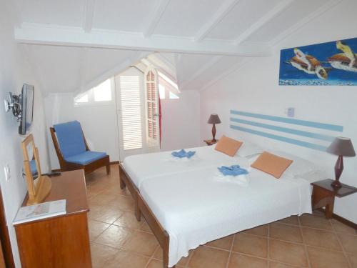 Postel nebo postele na pokoji v ubytování Hotel MiraBela