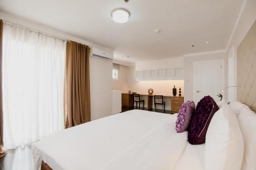 Sta Barbara Residence Hotelにあるベッド