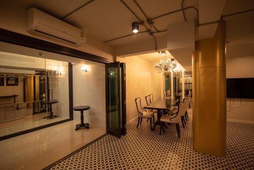 TV o dispositivi per l'intrattenimento presso Nanta Glam CM Hotel & Residences