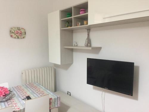 TV a/nebo společenská místnost v ubytování App sul lungomare