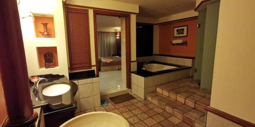 Ett badrum på Water Chalet or Premium Tower Seaview Port Dickson , Private Room