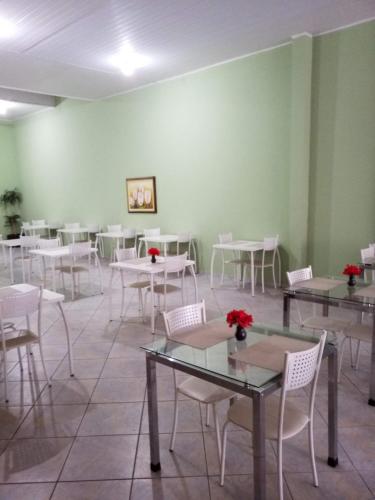 TV a/nebo společenská místnost v ubytování Hotel Pilar de Minas