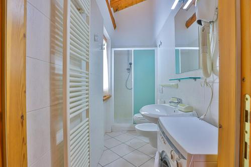 Ett badrum på Apartments La Gran Becca
