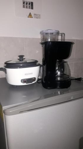 Kuchyň nebo kuchyňský kout v ubytování apto caney 401
