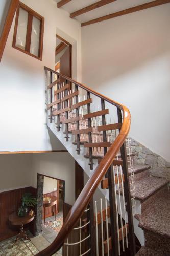 a winding staircase in a house at Villa María in La Laguna