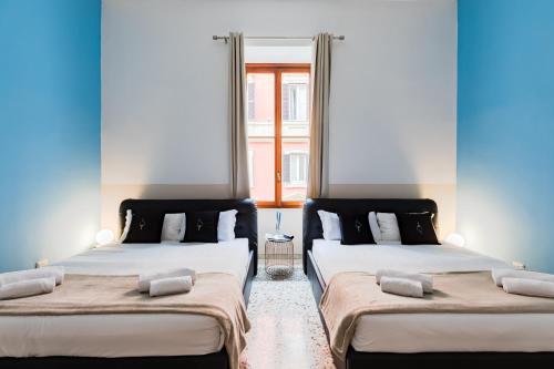 Voodi või voodid majutusasutuse A World Aparts - 55 Palermo toas
