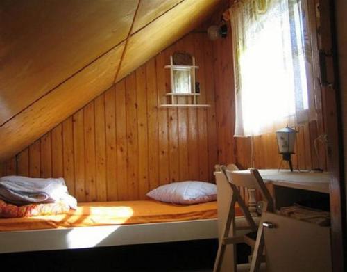 A bed or beds in a room at Kuke Holiday Home