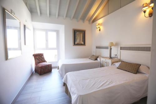 Postel nebo postele na pokoji v ubytování Apartamento Mar de Alborán
