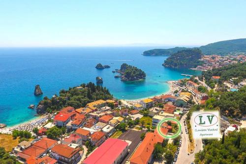 an aerial view of a town and the ocean at LV apartment-in the heart of Parga in Parga