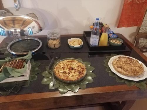 a table with some food on a table at Il Gesuita in Mantova