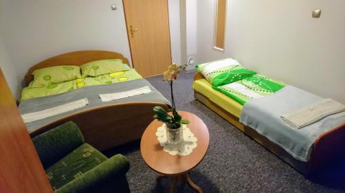 Кровать или кровати в номере Apartament Frezja