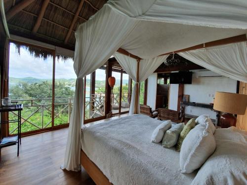 Una cama o camas en una habitación de Hotel Boutique Siete Lunas