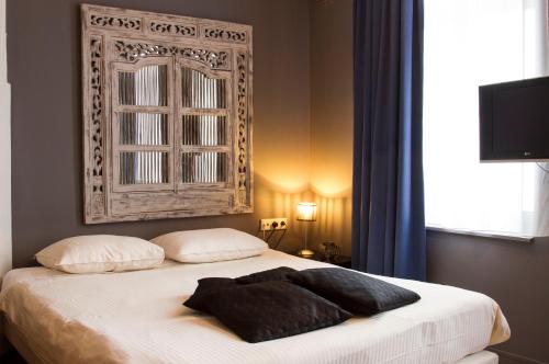 Postel nebo postele na pokoji v ubytování Hotel Matuchi