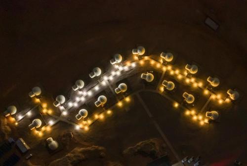 an overhead view of a row of white lights at Mazayen Rum Camp in Wadi Rum