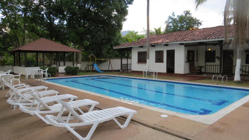 Bazén v ubytování Hotel Campestre Mucura nebo v jeho okolí