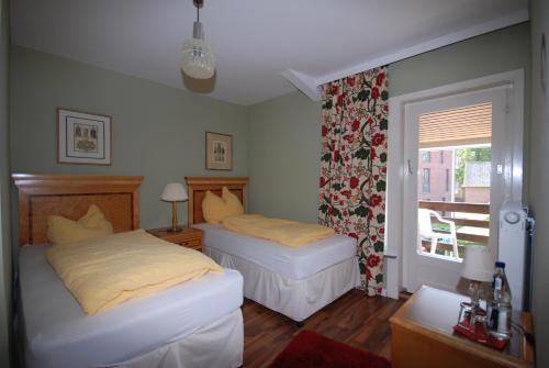 Ένα ή περισσότερα κρεβάτια σε δωμάτιο στο Hotel Cafe Frida