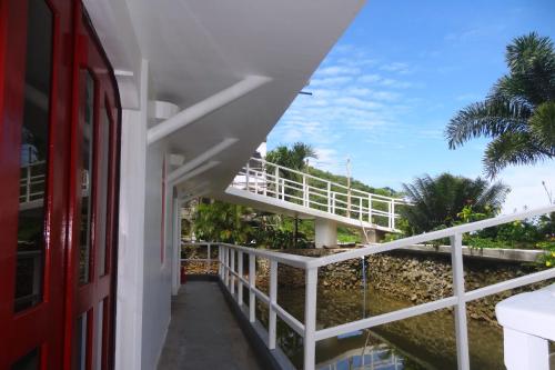 a view of the balcony of a house at Franswa Inn in El Nido