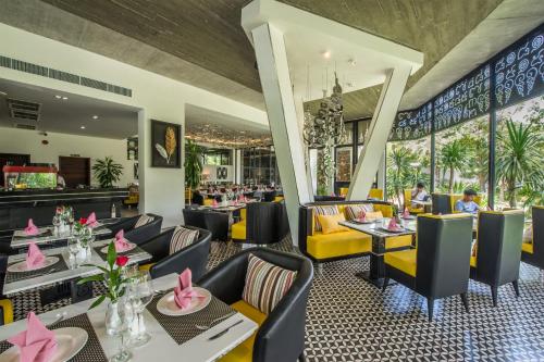 En restaurant eller et andet spisested på The Villa by Metta