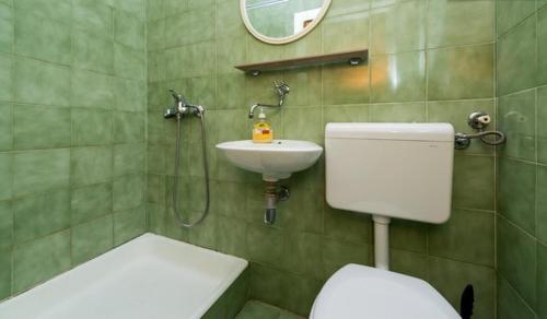Koupelna v ubytování Apartments Husanovic
