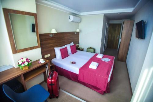 Posteľ alebo postele v izbe v ubytovaní Hotel Milot
