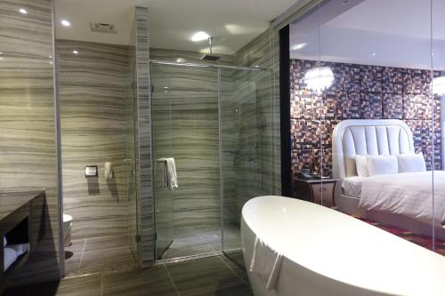 Kylpyhuone majoituspaikassa Sun Hao International Hotel