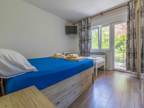 Postel nebo postele na pokoji v ubytování Apartment Zeljka