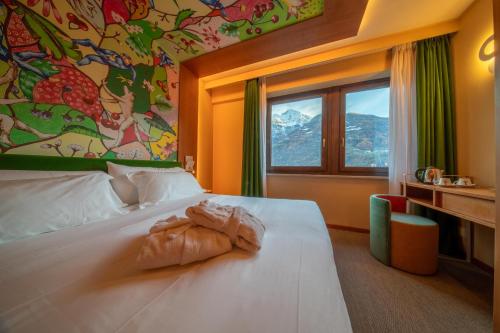 Afbeelding uit fotogalerij van OMAMA Hotel in Aosta