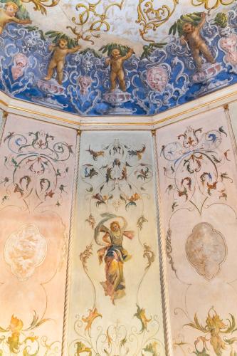 a painting of monkeys on the ceiling of a room at Ca' Vendramin Zago in Venice