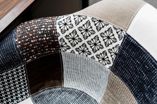 a close up of a hat on a couch at 043AKIHABARA in Tokyo