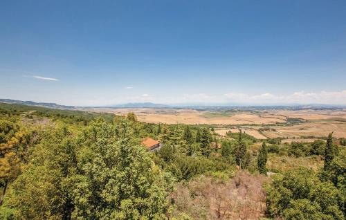 an aerial view of a house in the trees at La Ginestra - Terrazza in Orciatico