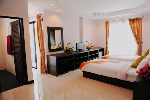 Katil atau katil-katil dalam bilik di Ice Kamala Beach Hotel