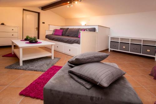 Posteľ alebo postele v izbe v ubytovaní Holiday House Alex