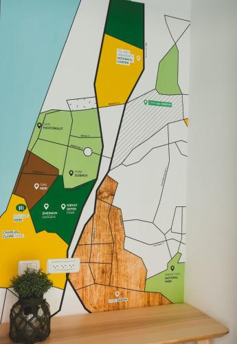 a map of the city of toronto on a wall at The Rambam Residence - By Localz Group in Tel Aviv