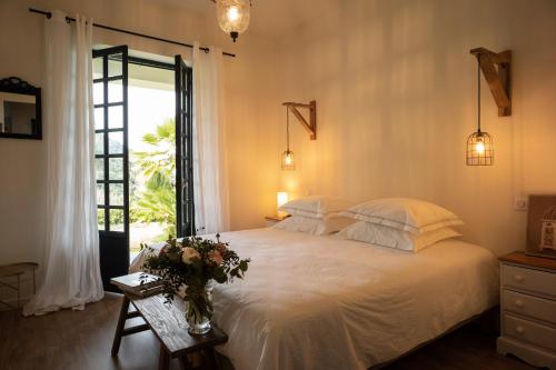 A bed or beds in a room at Villa Milanu