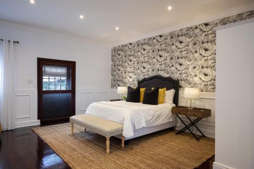 En eller flere senger på et rom på Stellenhof Guest House