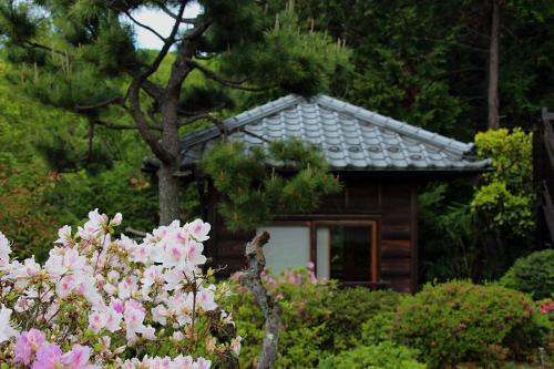 Ein Garten an der Unterkunft Kougetsu Sanso -- Moon Villa in Tokyo