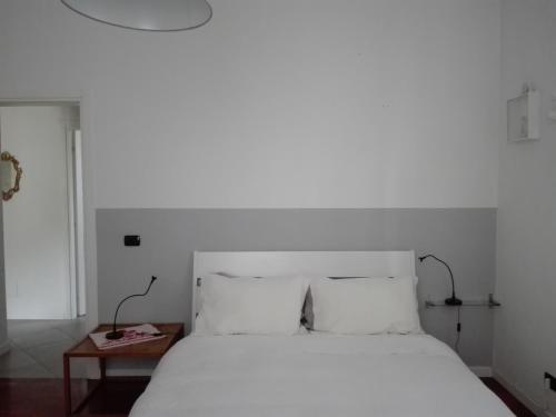 Ένα ή περισσότερα κρεβάτια σε δωμάτιο στο B&B Marana 14 Casa di Campagna