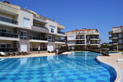 Басейн в Antalya belek odyssey park 1 ground floor 2 bedrooms pool view close to center або поблизу