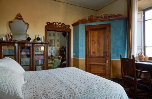 Ліжко або ліжка в номері Il Convento