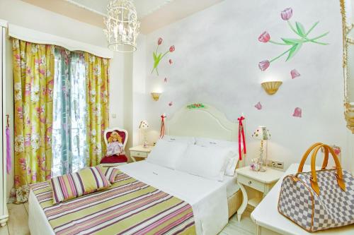 Postel nebo postele na pokoji v ubytování Archontiko Kymis Boutique Hotel