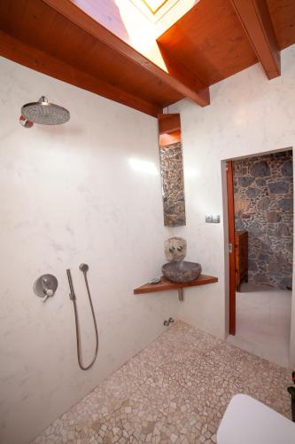 a bathroom with a shower and a sink at La Molina NK in Tindaya