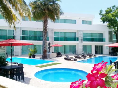 Bazén v ubytování Hotel Los Cocos Chetumal nebo v jeho okolí