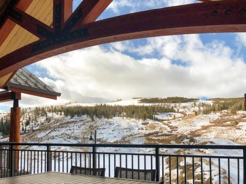 a view of a snowy mountain from a deck at Hyatt Vacation Club at The Ranahan in Breckenridge