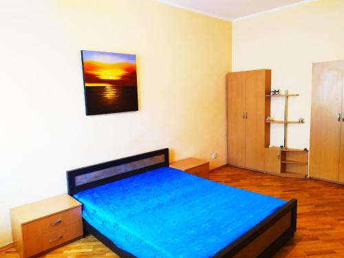 Postel nebo postele na pokoji v ubytování Апартаменты 2 комнаты Центр