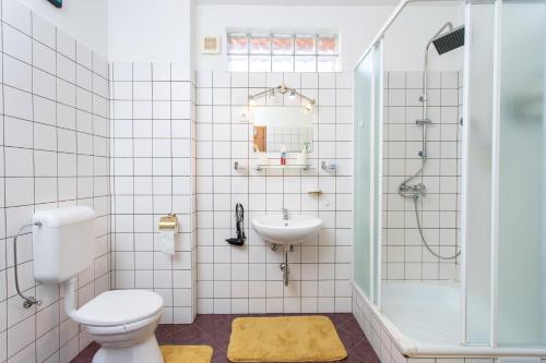 Kúpeľňa v ubytovaní Tip-Top Apartman Ház