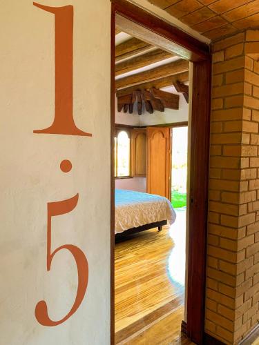 Ένα ή περισσότερα κρεβάτια σε δωμάτιο στο Hotel 1572 El Origen
