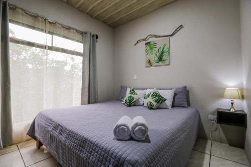 Ένα ή περισσότερα κρεβάτια σε δωμάτιο στο Apartamento Lantana