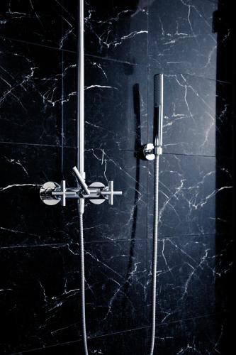 Un baño de Hotel Adele am Alex
