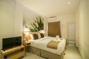 Ένα ή περισσότερα κρεβάτια σε δωμάτιο στο Deva Bali Apartement
